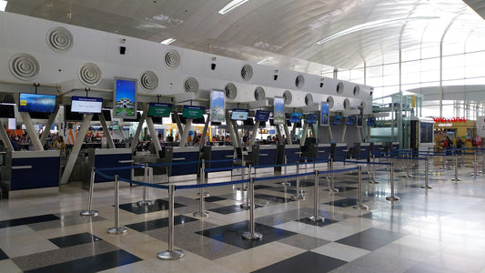 Image showing tips and precautions for protecting film rolls during airport security screening, including using lead-lined bags, requesting hand inspection, and packing film in carry-on luggage.